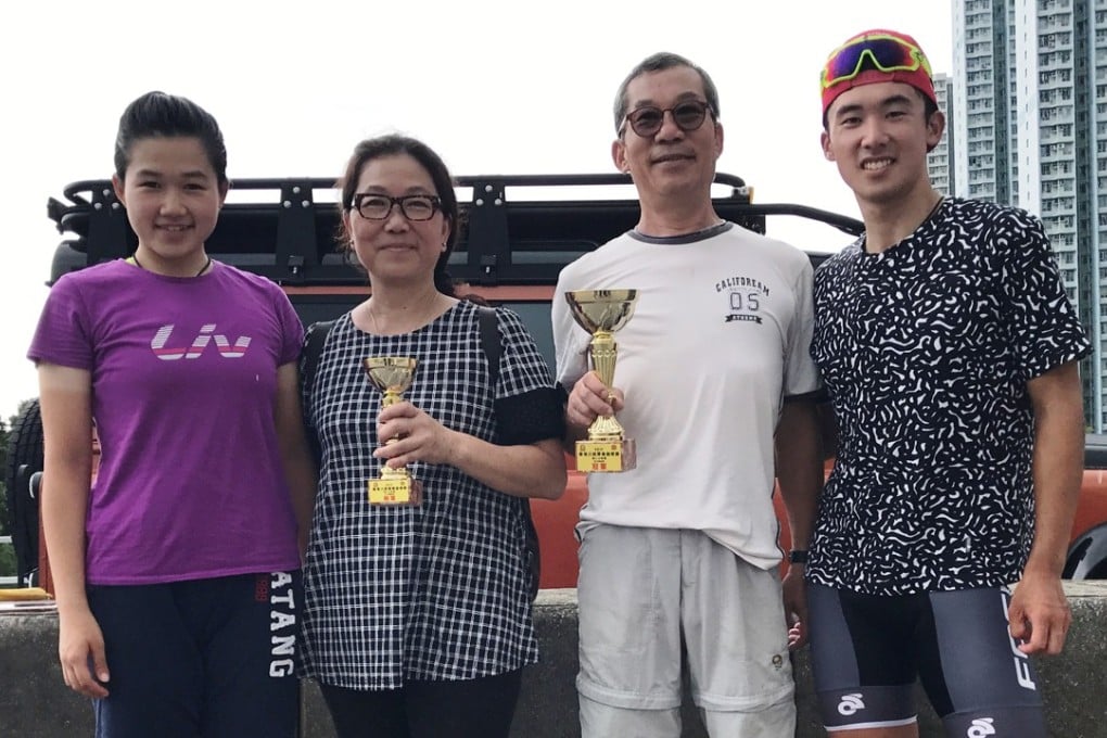 Newly crowned Hong Kong road race champion Leung Chun-wing celebrates his success with his parents and sister on Father's Day. Photo: Chan Kin-wa