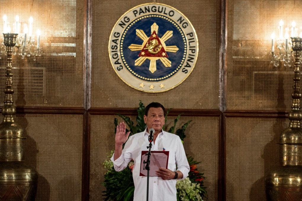 Philippine President Rodrigo Duterte officiates a mass oath taking of officials at the Malacanang Palace in Manila. Photo: AFP