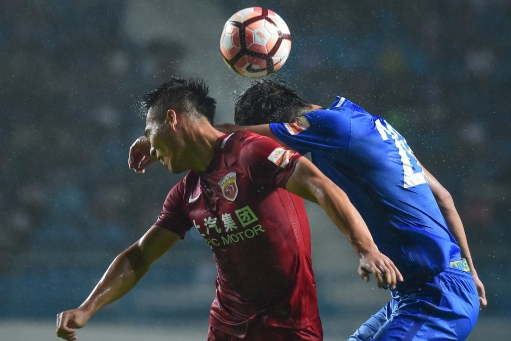 Shangahi SIPG and Guangzhou R&F played out a 1-1 in CSL action on Sunday night. Photos: Xinhua
