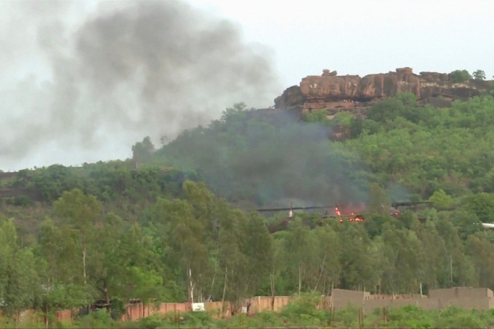 Flames rise following an attack where gunmen stormed Le Campement Kangaba resort in Dougourakoro, to the east of the capital Bamako, Mali. Photo: Reuters