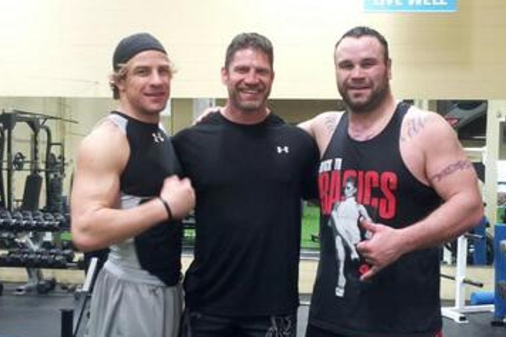 Tim Hague (right) pictured in 2013. Photo: @mmamike