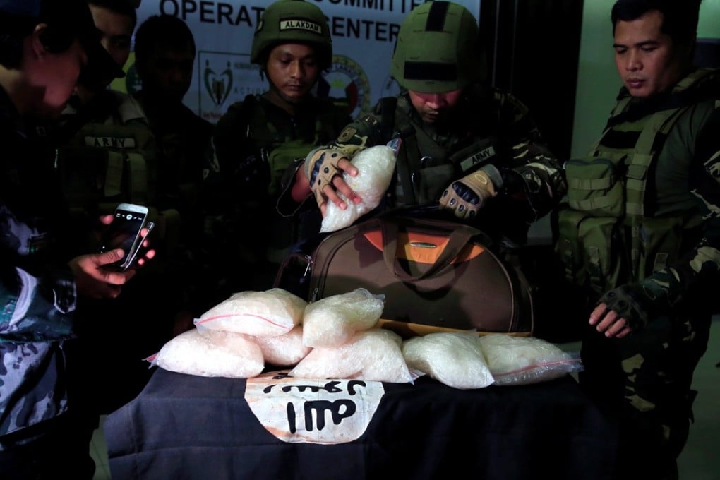 Government forces display 11kg worth methamphetamine recovered by troops from the Maute group in a conflict area in Marawi City. Photo: Reuters