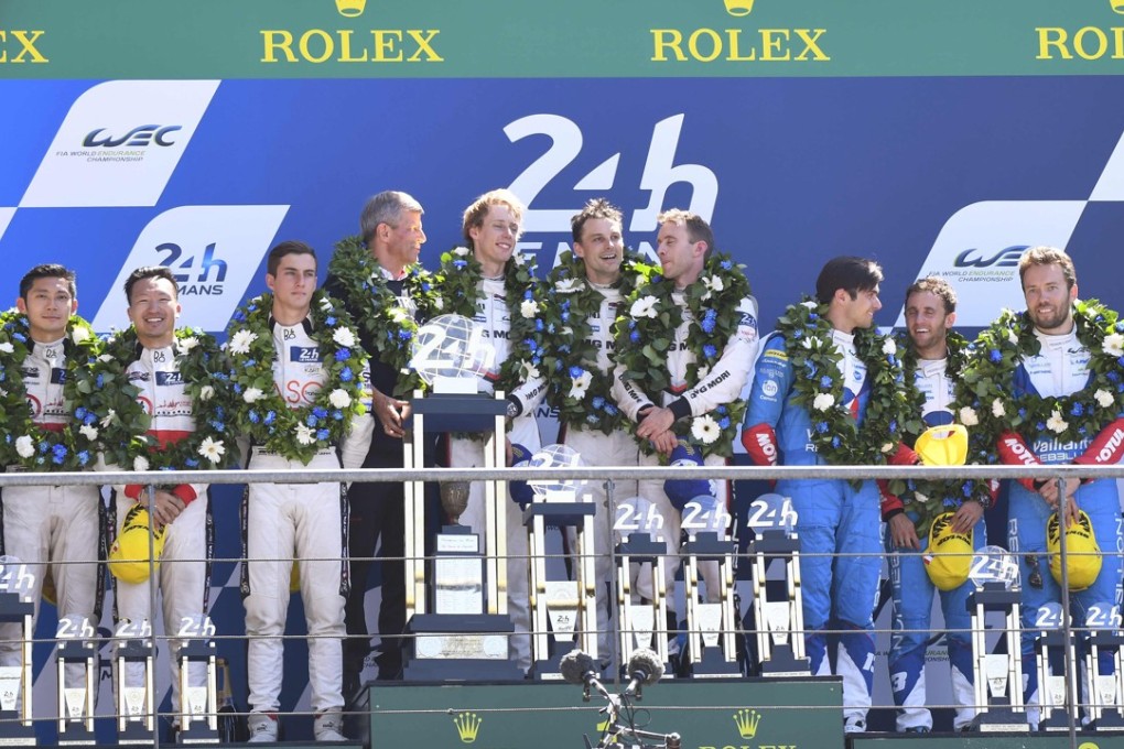 Porsche (centre), Jackie Chan DC Racing (left) and Oreca-Gibson on the podium. Photo: AFP