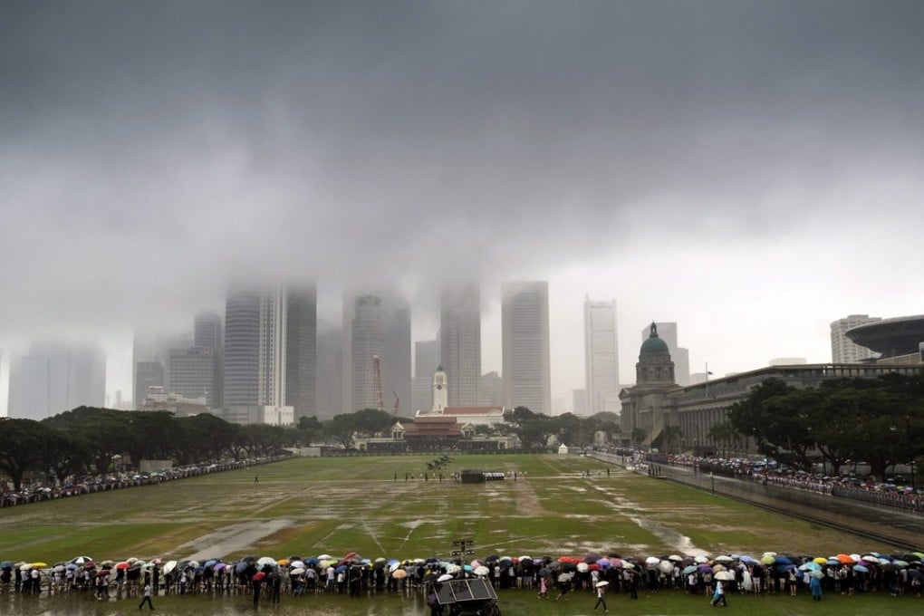 Storm clouds over Lee Kuan Yew’s funeral procession. Photo: EPA