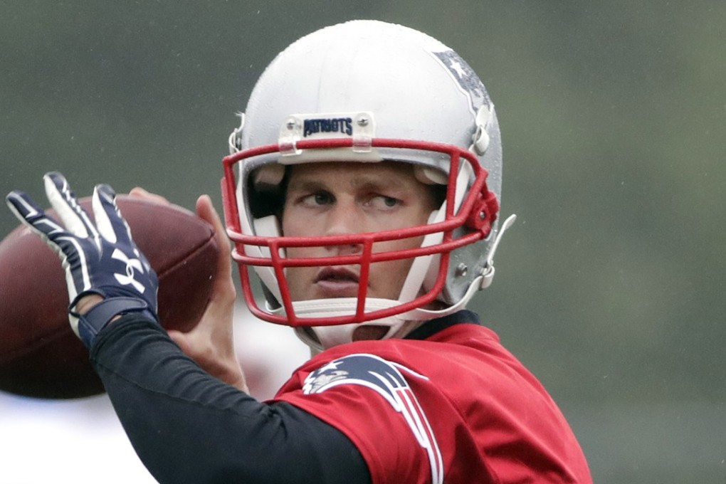 New England Patriots quarterback Tom Brady passes the football during an NFL football team practice Tuesday, June 6, 2017, in Foxborough, Massachusetts. Brady said he hopes to play in China before he retires from the NFL. Photo: AP