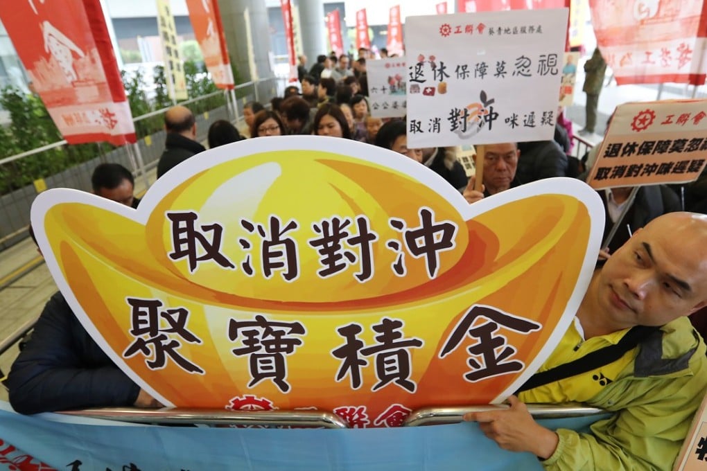 Members of the Hong Kong Federation of Trade Unions protesting outside the legislature. Photo: Edward Wong