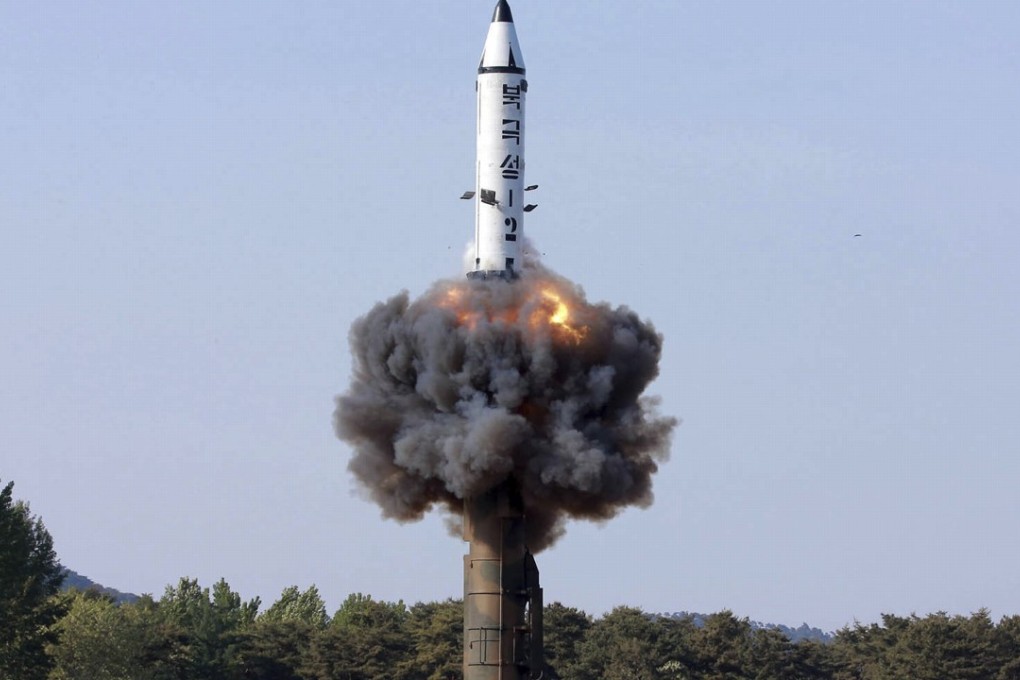 North Korea tests a solid-fuel rocket in this May 22 photo distributed by the North Korean government. Photo: AP