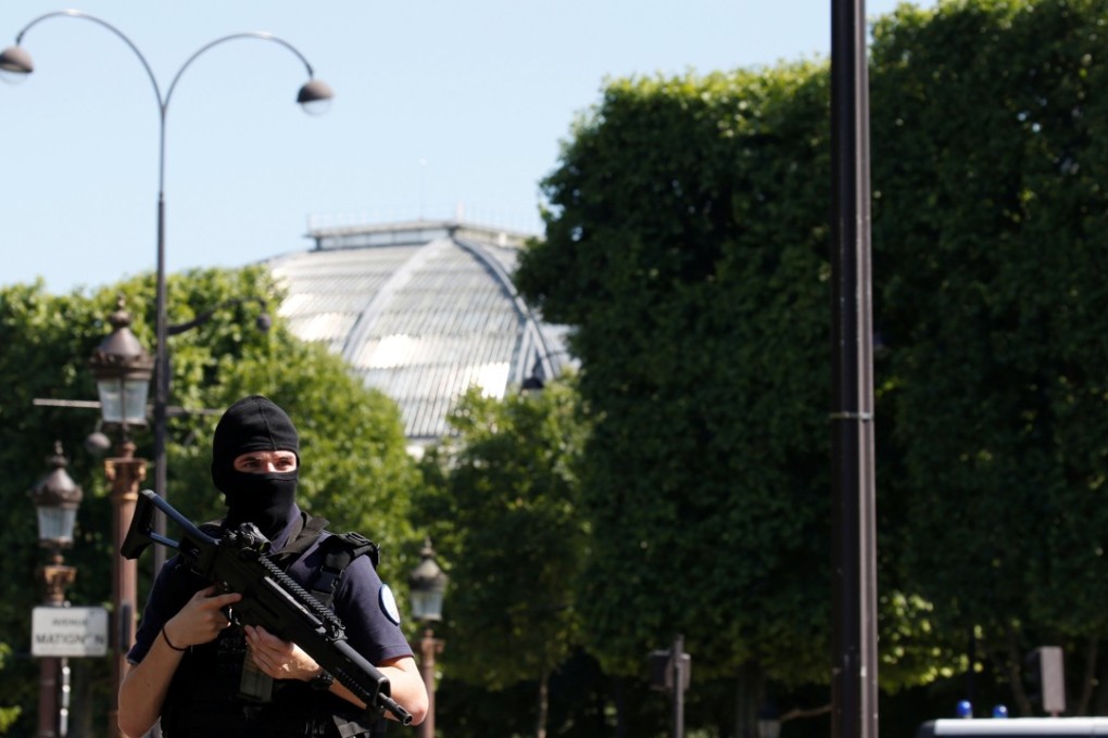 Car explodes after hitting police van in attack on Paris’s Champs ...