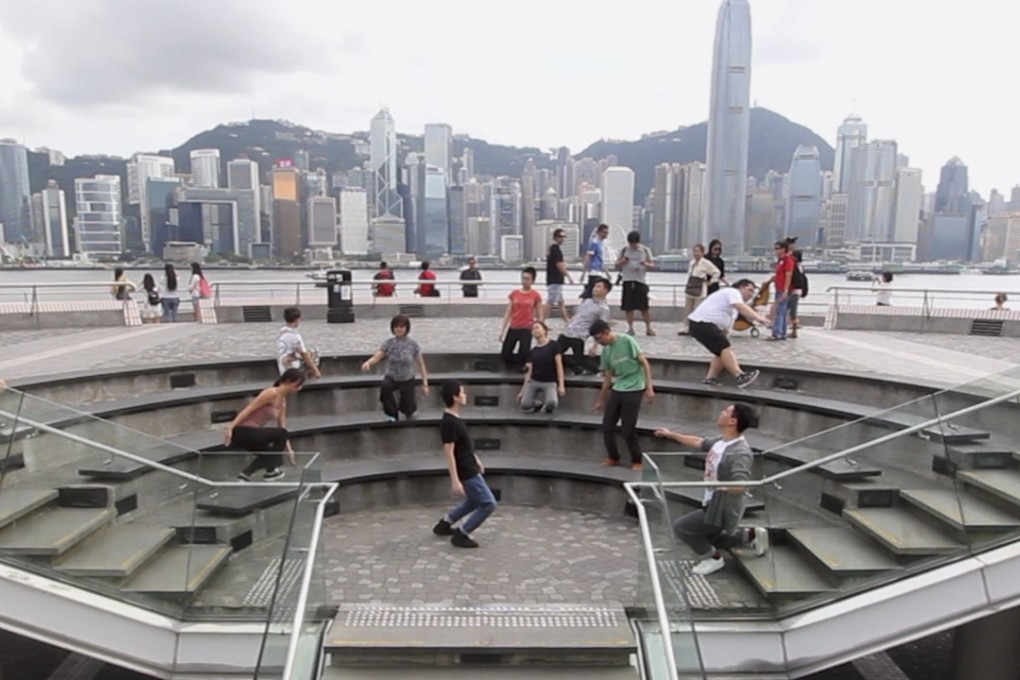 A screen grab from Yim Sui-fong’s performance art piece Fall Like a Feather in Tsim Sha Tsui. Photo: courtesy of Yim Sui-fong