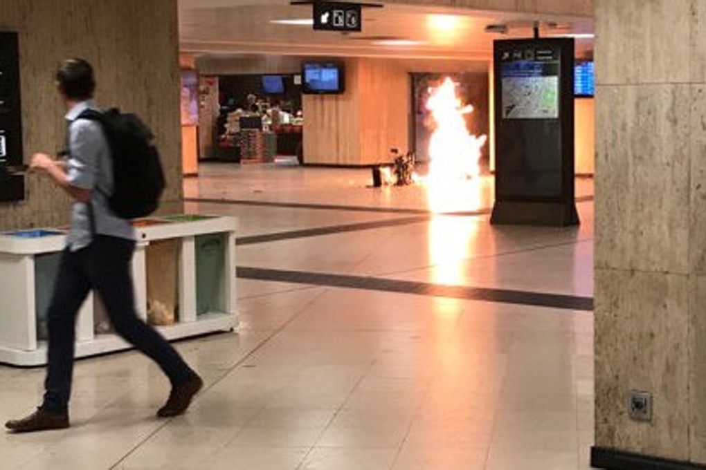 Social media images showed an intense yet contained ball of fire in a nearly empty underground arrival hall at Brussels central station. Photo: Twitter/@remybonnaffe