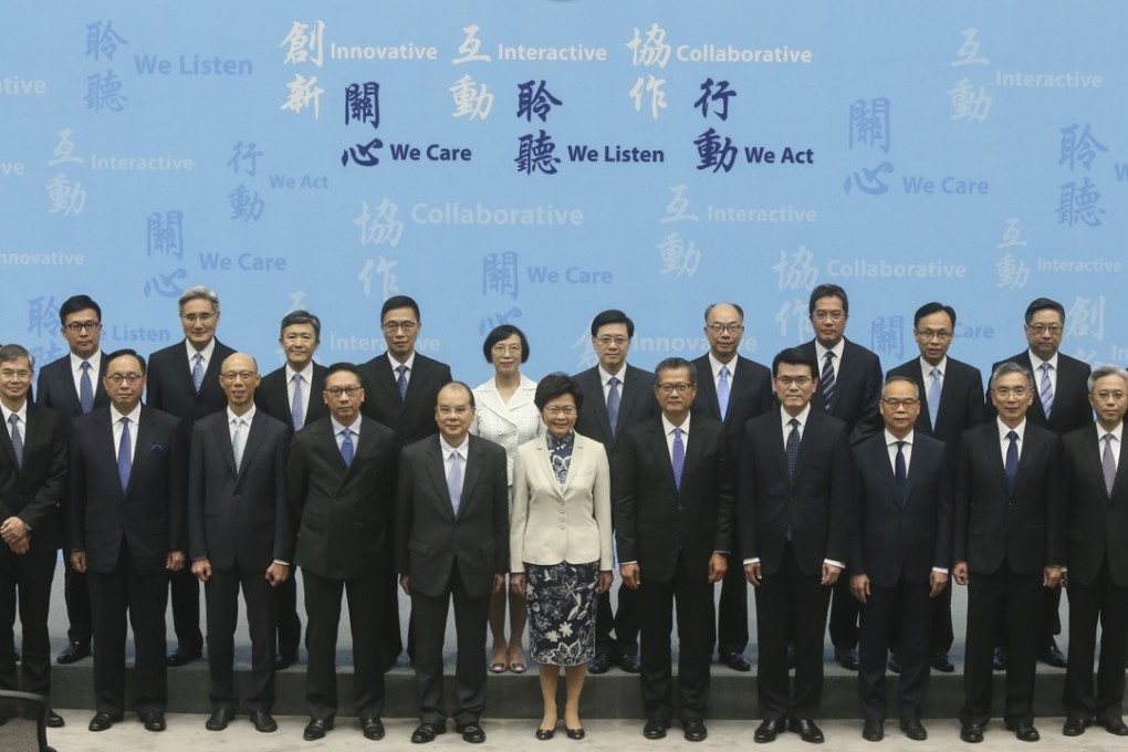 Carrie Lam’s cabinet lines up for the media on Wednesday. Photo: Sam Tsang