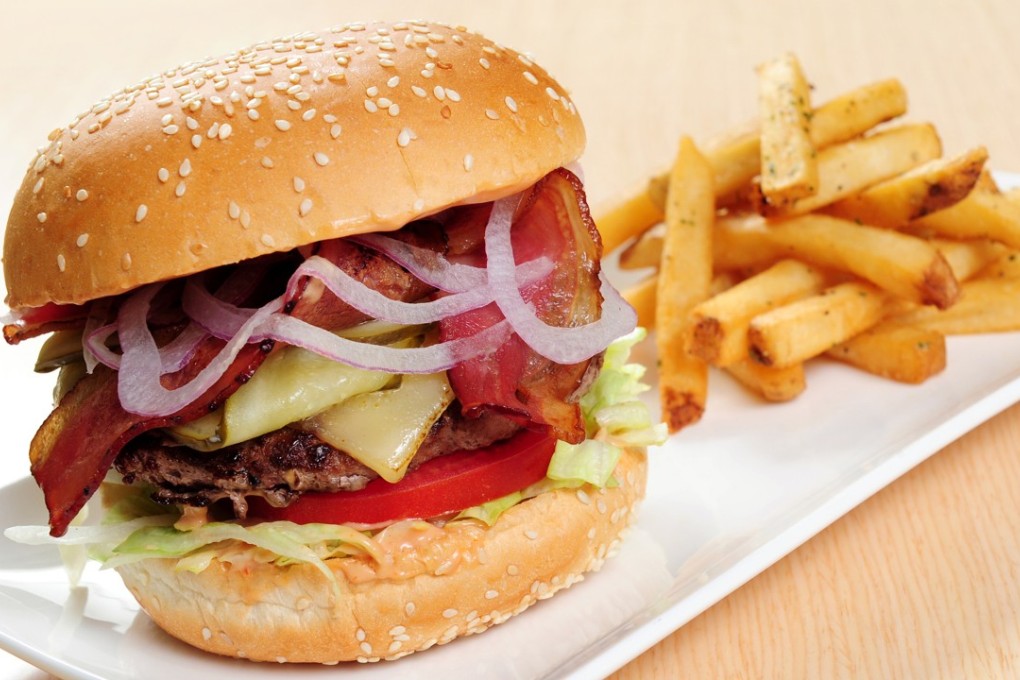 The Beer House’s burger with bacon, cheese and house seasoning
