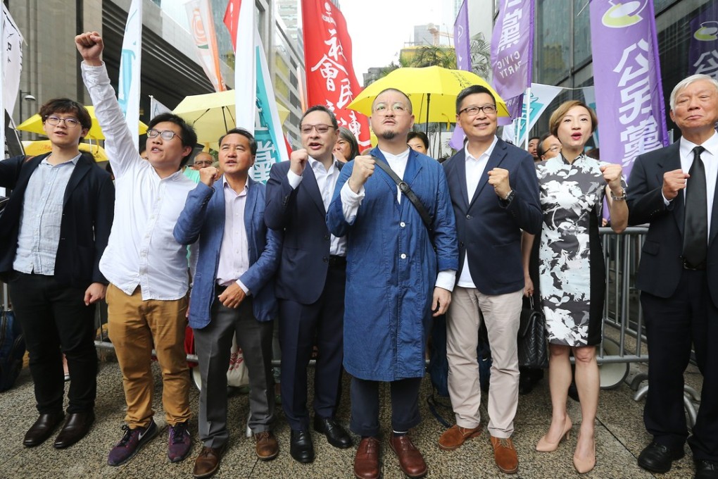 (Left to Right) Tommy Cheung Sau-yin, Raphael Wong Ho-ming, Lee Wing-tat, Benny Tai Yiu-ting, Shiu Ka-chun, Chan Kin-man, Tanya Chan Suk-chong, and Chu Yiu-ming protest outside District Court in Wan Chai on June 15, 2017 to support those arrested over the 79-day pro-democracy Occupy protests in 2014. Photo: Dickson Lee
