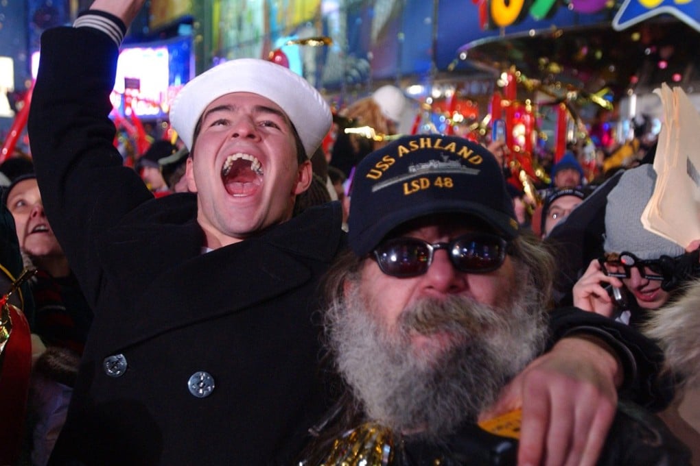 New York revellers cheer in the New Year in typically noisy fashion in Times Square. Photo: AP