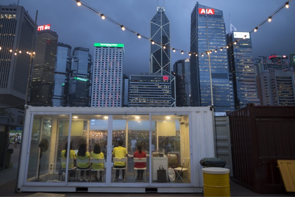 Commercial buildings in the business district of Central in Hong Kong. Runaway home prices exacerbated by cross-border capital flight have made home ownership an increasingly unattainable dream for many Hongkongers. Photo: EPA
