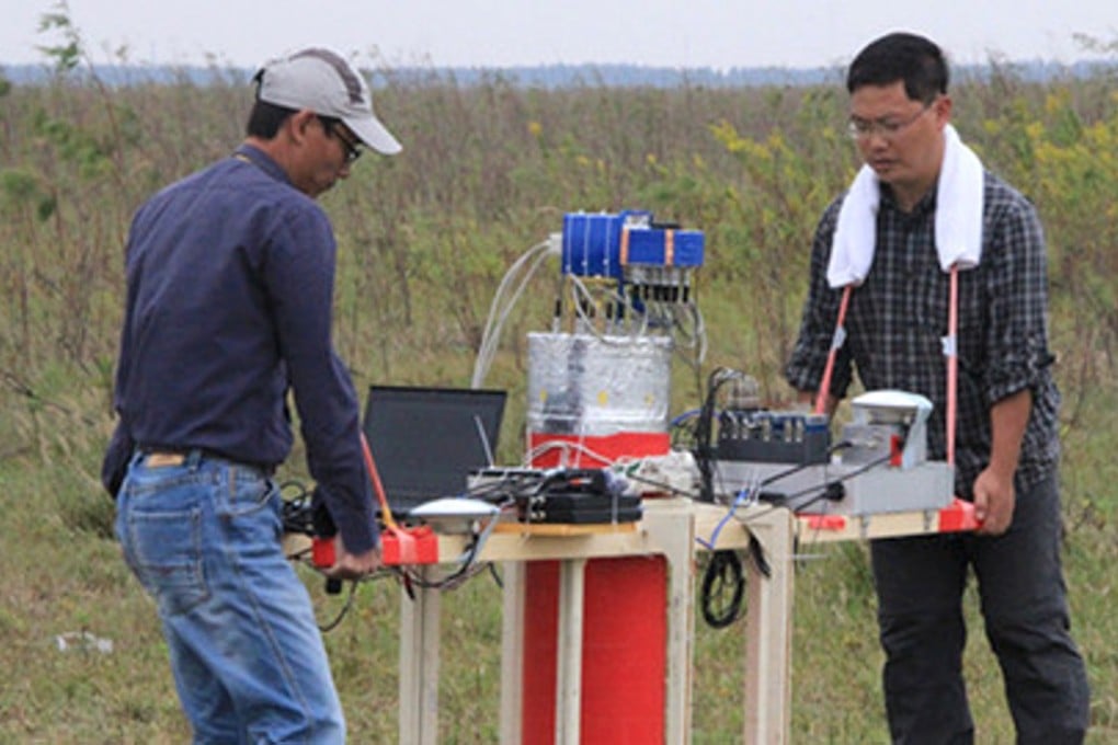 Scientists field test a prototype of a MAD device in this file photo taken in 2014. Photo: Handout