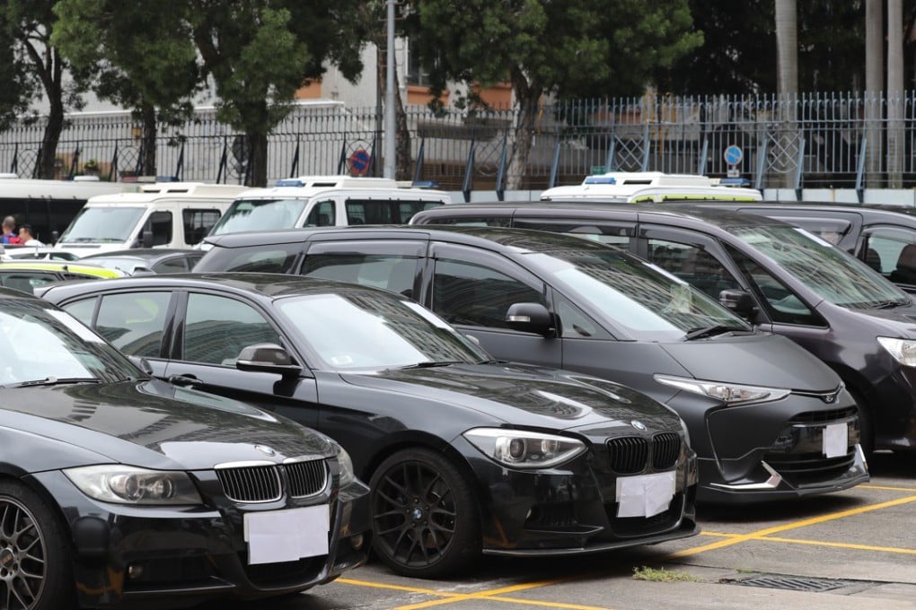 Impounded Uber vehicles at Sham Shui Po police station, after more than 20 drivers were arrested in raids following a three-week undercover police operation, on May 23. Photo: Edward Wong