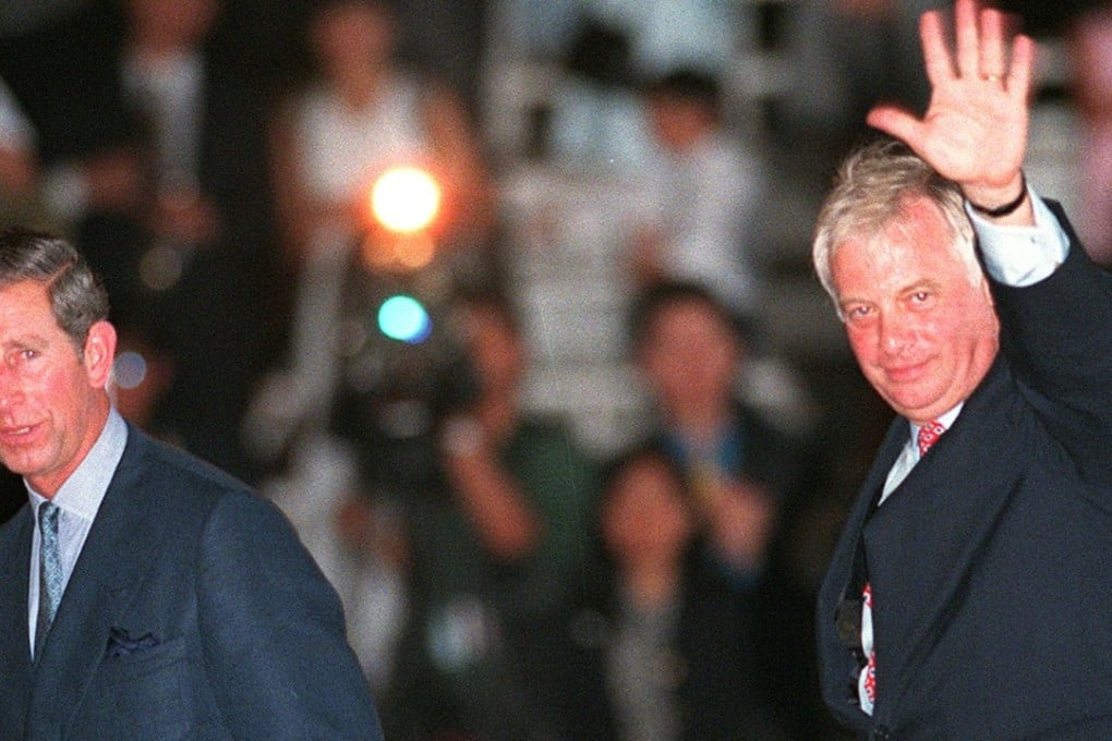 Hong Kong’s last governor Chris Patten (right) waves to well-wishers as he boards the Royal Yacht Britannia accompanied by Prince Charles prior to their departure from Hong Kong. Photo: AFP Romeo Gacad