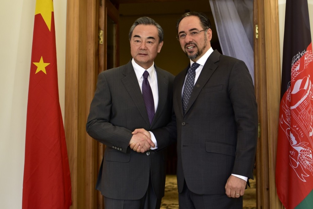 Foreign Minister Wang Yi with his Afghan counterpart Salahuddin Rabbani during their meeting in Kabul on the weekend. Photo: Xinhua