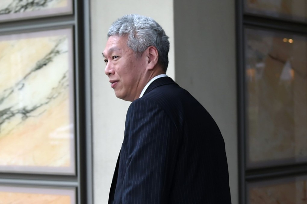 Lee Hsien Yang (in picture) and his sister Lee Wei Ling are at odds with their eldest brother Lee Hsien Loong over the status of a family home. Photo: AFP/ ROSLAN RAHMAN