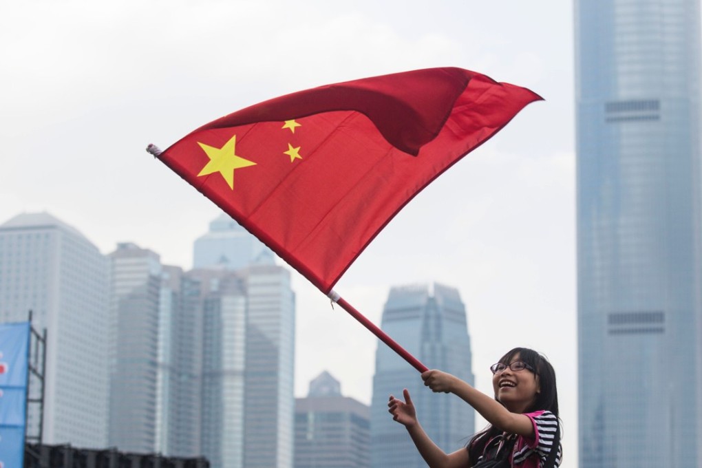 A youth waves the Chinese flag. Photo: AFP