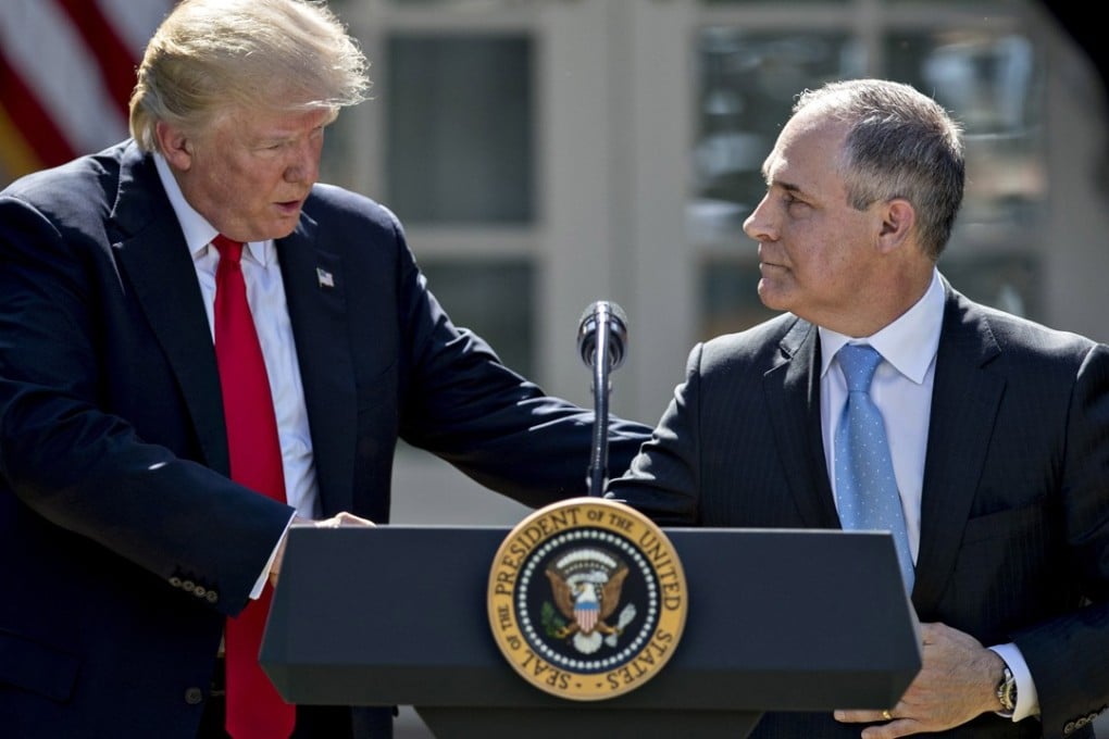 US Donald Trump with Scott Pruitt, his appointee as administrator of the US Environmental Protection Agency, in the Rose Garden of the White House on June 1. Pruitt has endorsed Trump’s view that the Paris agreement was an international plot against American business. Photo: Bloomberg