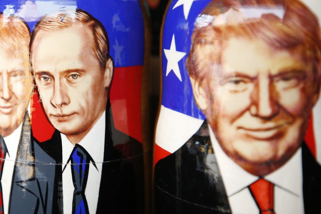 Traditional Russian Matryoshka wooden dolls also known as nesting dolls with the images of US President Donald Trump and Russian President Vladimir Putin in Moscow. Photo: EPA