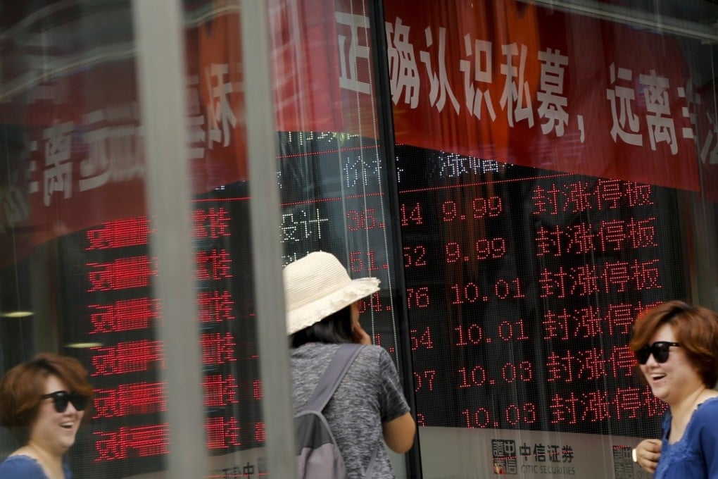 A brokerage house displaying stock trading in Beijing, last Wednesday, the day after global stock benchmark provider MSCI said that it's including yuan-denominated "A-shares" of 222 large Chinese companies to its Emerging Markets index. Photo: AP