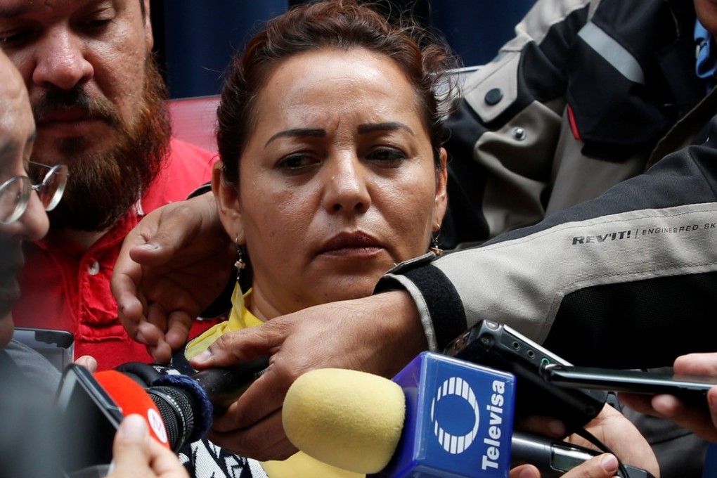 Frida Urtiz, wife of reporter Salvador Adame Pardo, speaks to the media during a protest against the May 18 disappearance of her husband. His burned remains have been identified by the authorities. Photo: Reuters