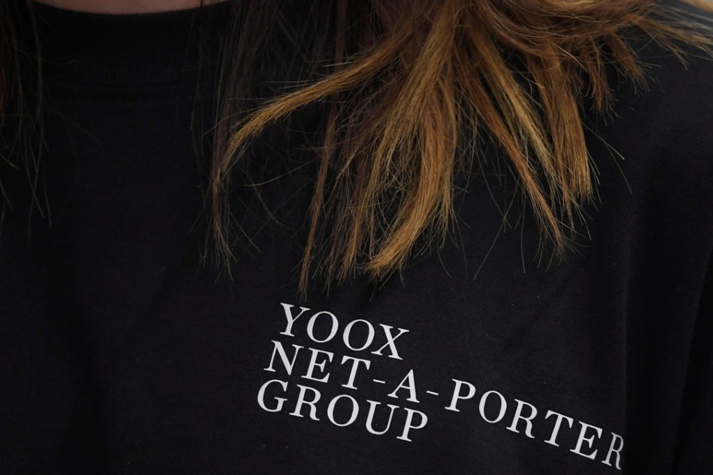 An employee of online clothing retailer Yoox Net-A-Porter, at its Tech Hub premises in White City in London. Shares in the company has risen on a report that Chinese e-commerce giant, Alibaba Group was interested in buying the company. .But a source at the company who did not want to be named has now told South China Morning Post the report “is not true”. Photo: Reuters