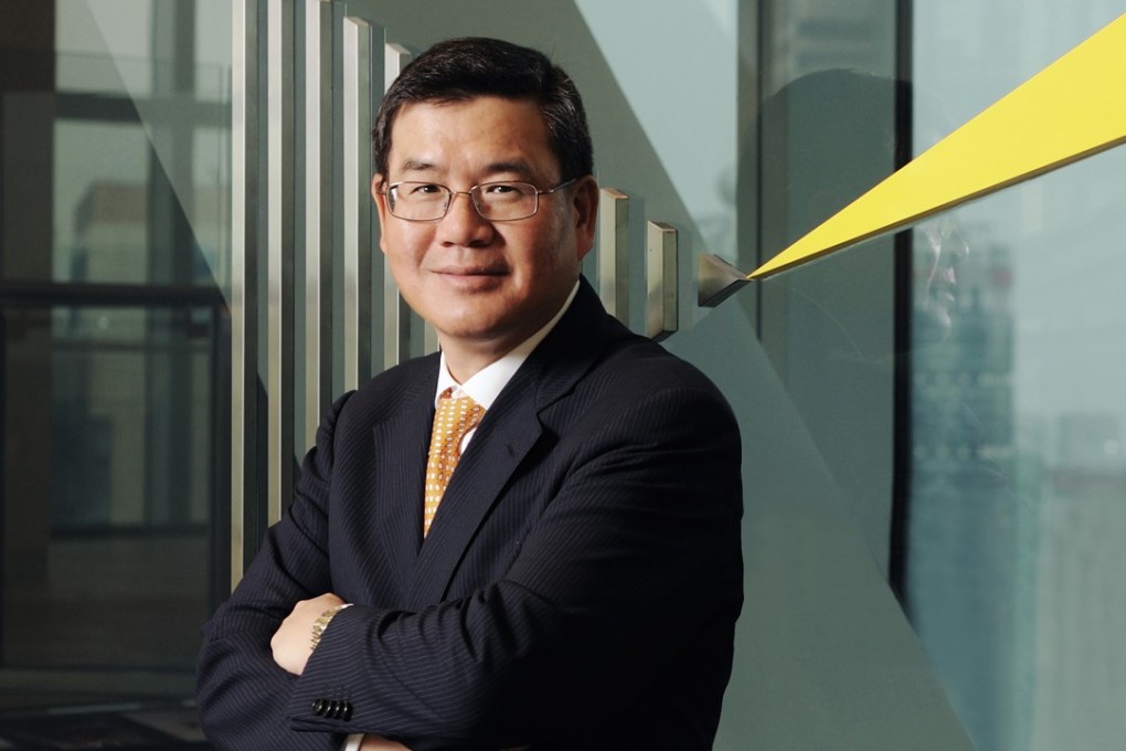 EY China chairman Albert Ng said the delay in approval for M&As is not unreasonably long. Photo: SCMP