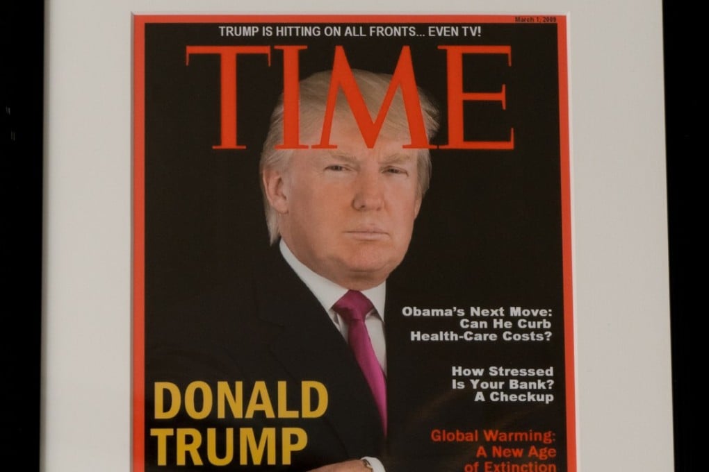 A framed copy of a supposed cover of Time Magazine hangs from a wall at the Trump National Doral Miami Golf Shop. The cover is fake. Photo: Washington Post