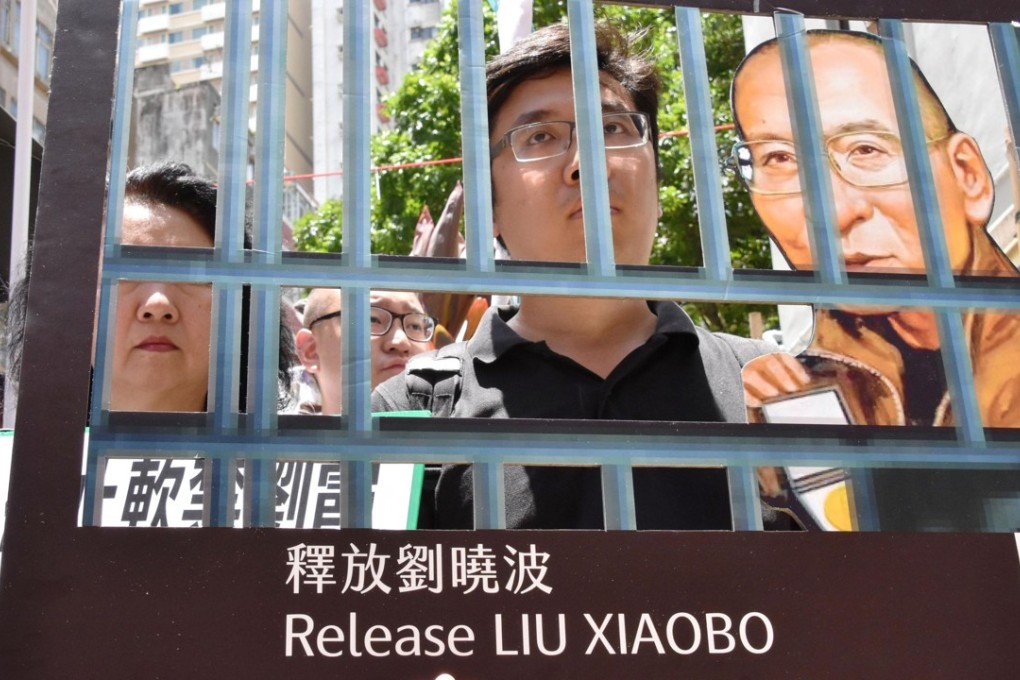 Pro-democracy campaigners demonstrate in Hong Kong on June 27, 2017, calling for the full release of Chinese Nobel Peace Prize laureate Liu Xiaobo, following the revelation of his cancer diagnosis. Photo: Kyodo