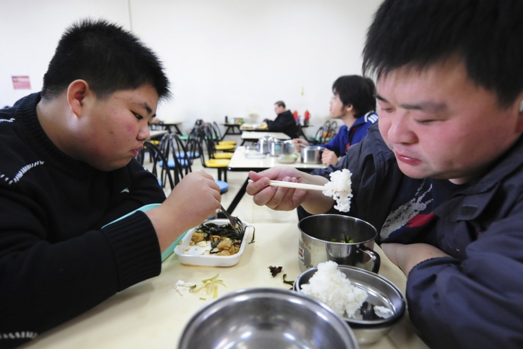 Patients eat lunch at a weigh reduction clinic in Tianjin, China. The country is facing the biggest diabetes epidemic in the world. Photo: AFP