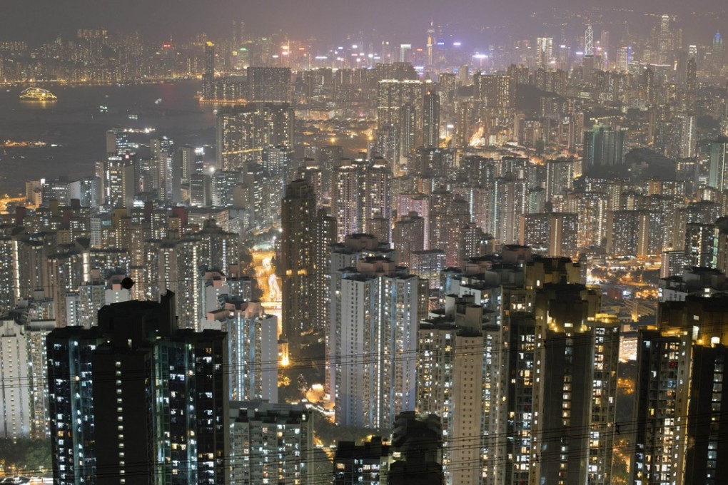 Apartment buildings and office blocks clustered tightly together in Hong Kong's Kowloon district. Home prices in the crowded area of the city have risen by 120 per cent since 2008, and by more than 30 per cent from their previous peak in 1997. Photo: AFP