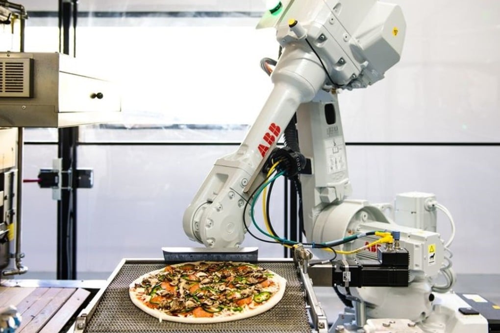 One of Zume's pizza-making robots in action. Photo: Zume Pizza
