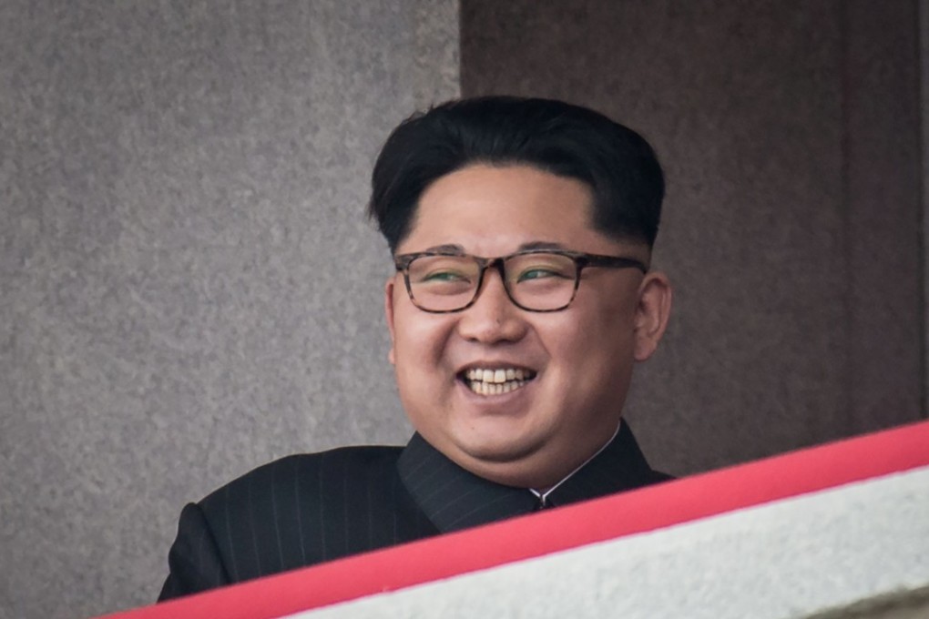 North Korean leader Kim Jong-un watches a military parade and mass rally in Pyongyang on May 10. Photo: AFP