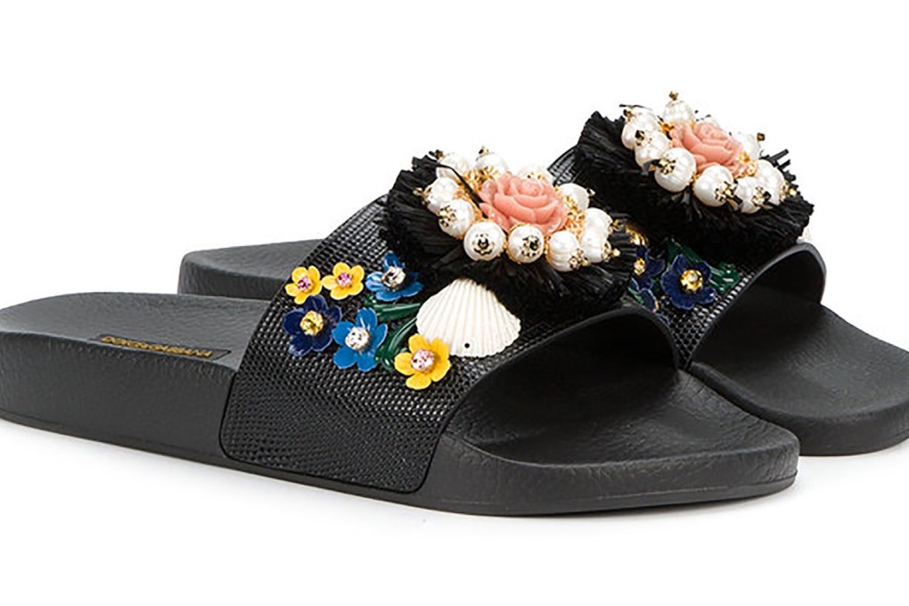 Catch some rays in Linda Farrow shades, Dolce & Gabbana slides and an adorable off-the-shoulder bikini by Lisa Marie Fernandez