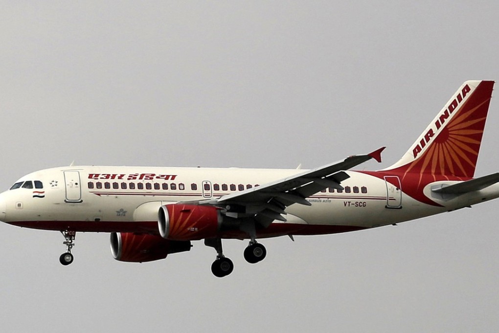 An Air India aircraft prepares to land at the Indira Gandhi International airport in New Delhi, India. India's federal cabinet has approved a plan to privatise its debt-ridden national carrier Air India. Photo: AP