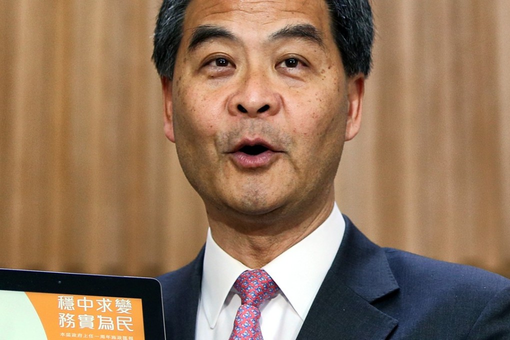 Chief Executive Leung Chun-ying speaks to the press at the government headquarters in Tamar introducing a report summarising his achievement over the course of this year. Photo: Sam Tsang