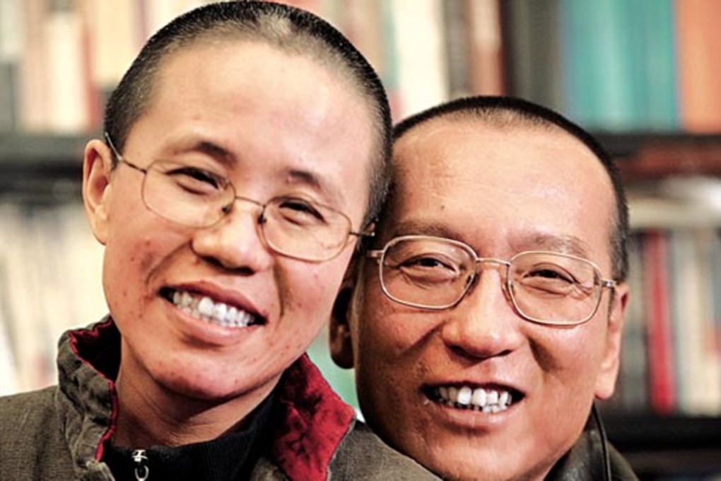 Liu Xiaobo (right) and his wife Liu Xia pictured before his imprisonment on subversion charges. Photo: Reuters