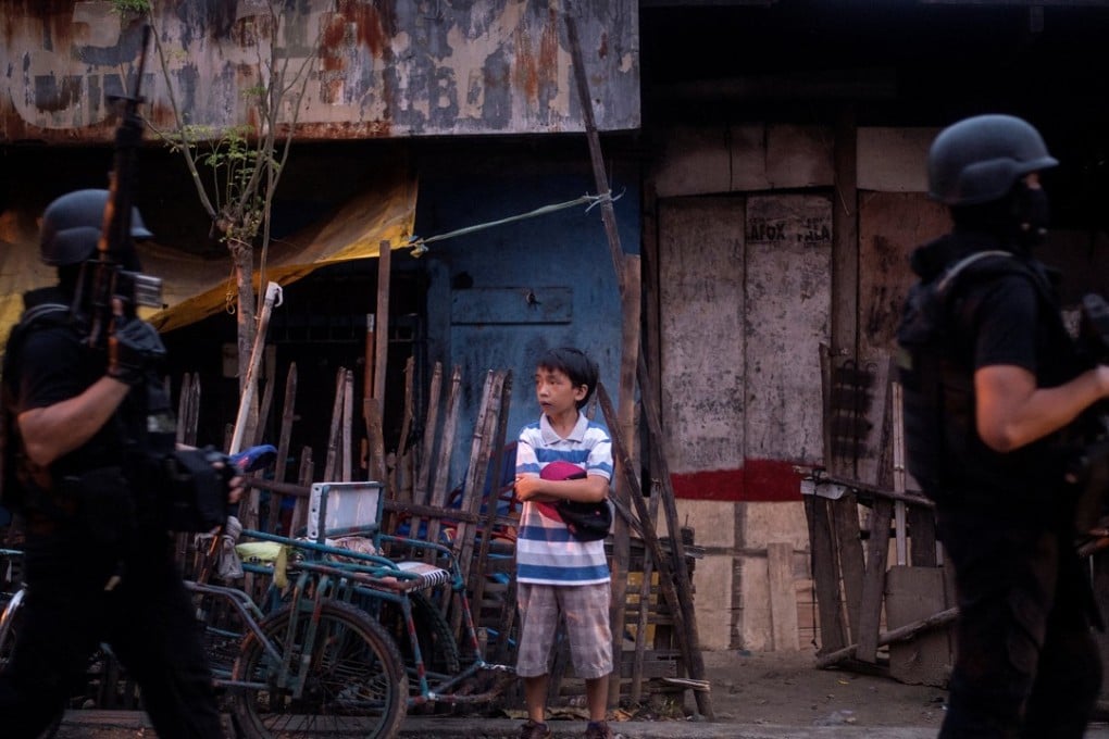A Philippine SWAT team patrol a neighbourhood in Mindanao, where Philippine President Rodrigo Duterte has declared martial law. Photo: AFP