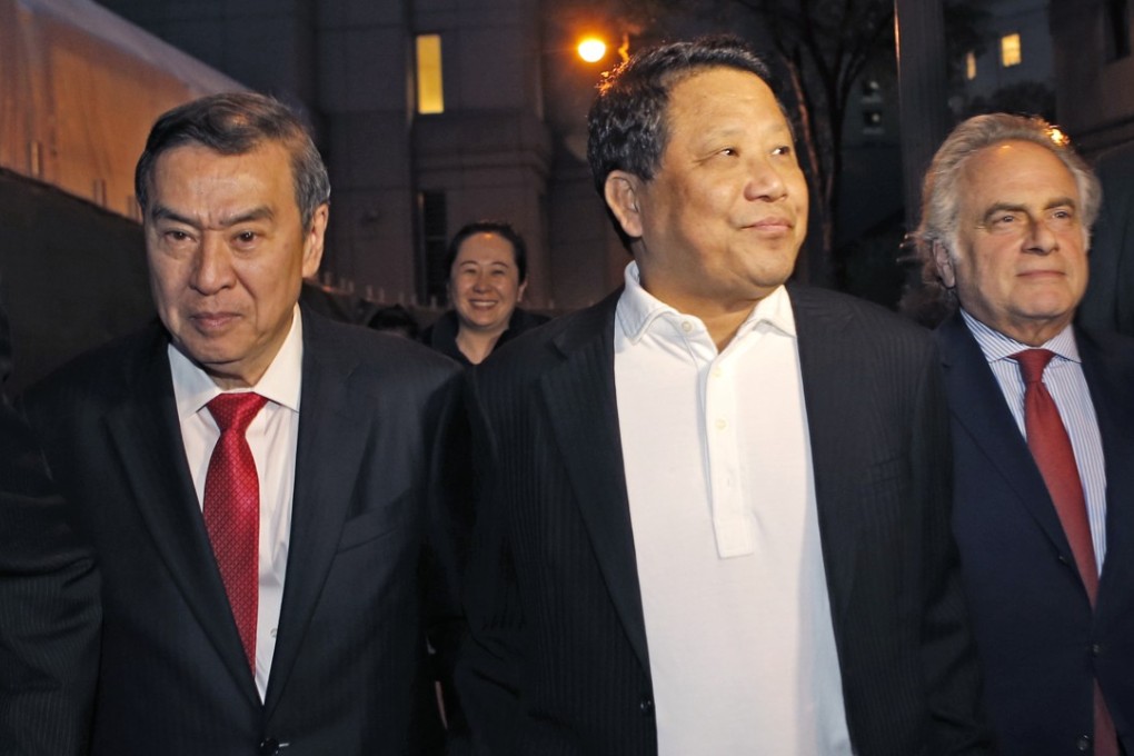 In this October 26, 2015, file photo, Macau billionaire Ng Lap-seng, centre, leaves federal court with his attorney Benjamin Brafman, right, after he was released on bail in connection with a United Nations bribery scheme in New York. Photo: AP