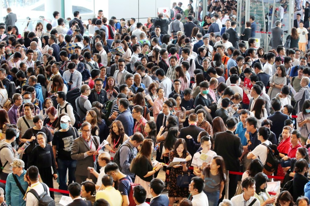 Crowds today continue to flock to new-flat launches despite the record-high property prices. Photo: Edward Wong g