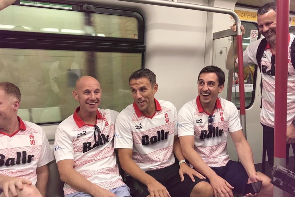 Paul Scholes, Nicky Butt, Phil Neville, Gary Neville and Ryan Giggs, the 'Class of 92', ride the MTR in Hong Kong. Photo: Andy Mitten / Twitter