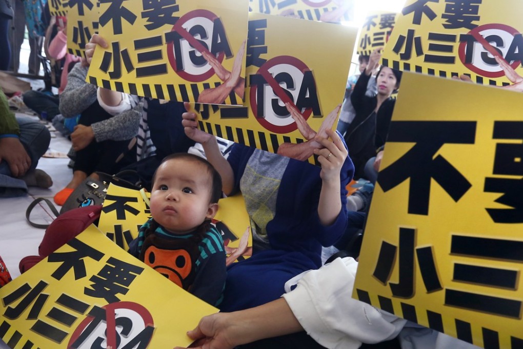 A concern group and parents protest over the TSA test. Photo: Jonathan Wong
