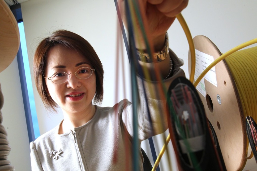 Jennifer Tan Yuen-chun, the chief operating officer at Hutchison Telecom, which owns more than 1.4 million kilometres of fibre optic cable. The network covers more than 90 per cent of commercial buildings across the city, almost 2 million Hong Kong households, cross-border links to mainland China and overseas cable connections. Photo: Dickson Lee