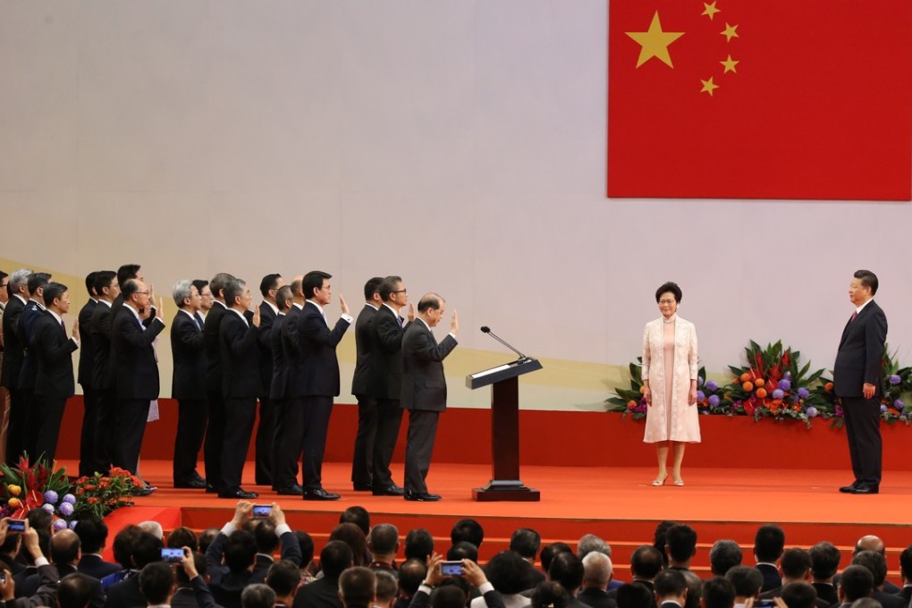 Hong Kong’s new government is sworn in before Xi Jinping. Photo: Sam Tsang