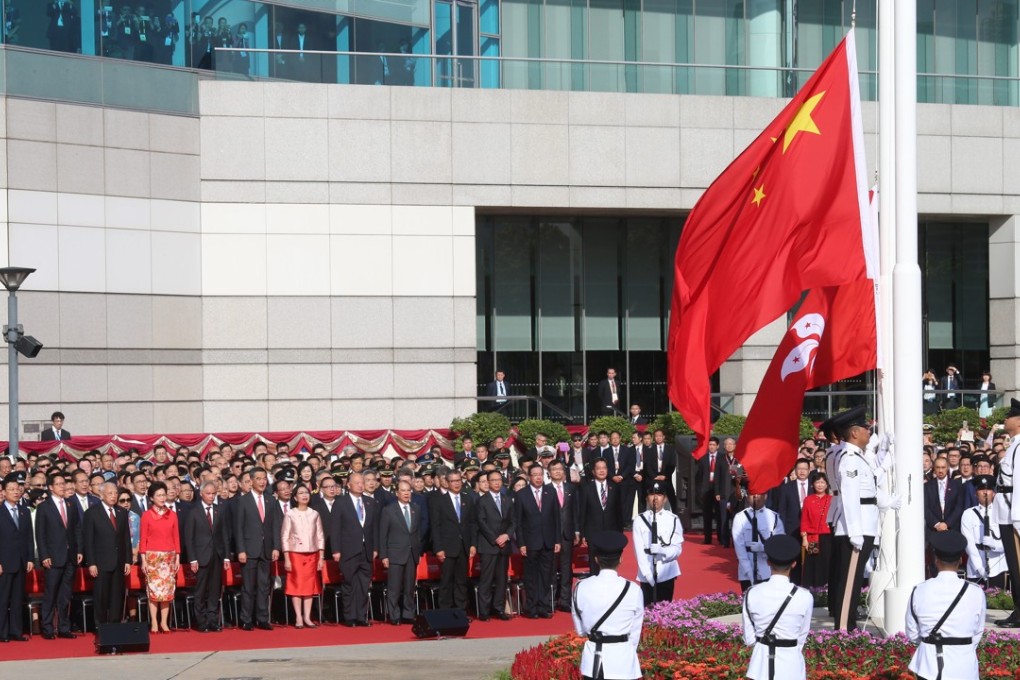 Carrie Lam led the flag-raising ceremony at Golden Bauhinia Square. Photo: K. Y. Cheng