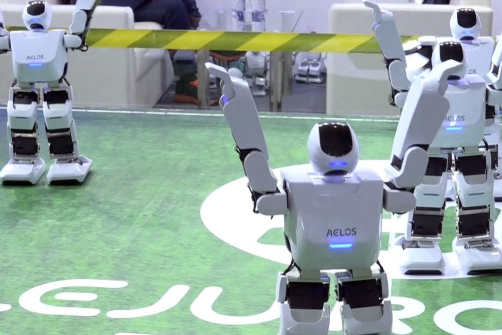 Robots from Shenzhen-based start-up Aelos Robotic perform with heightened dexterity at the Shanghai CES electronics show in early June. More than 50 companies showcased a new generation of robots – mostly to serve as companions in the home or butlers in shopping malls – at the show. Photo: AP